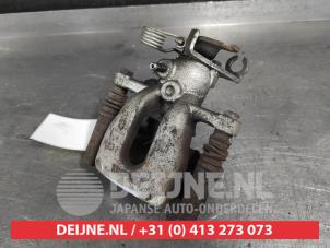 Mitsubishi Colt Bremszange links hinten O710247 foto 2