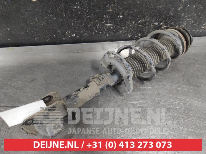 Suzuki Swift Schokdemperpoot links-voor O710250