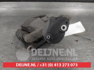 Suzuki Swift Remklauw (Tang) links-voor O710500 foto 3