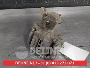 Suzuki Swift Bremszange links hinten O710502 foto 2