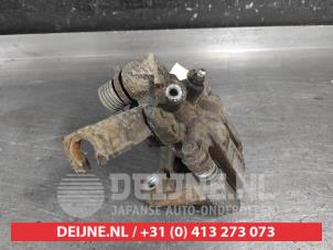 Suzuki Swift Bremszange links hinten O710502 foto 3