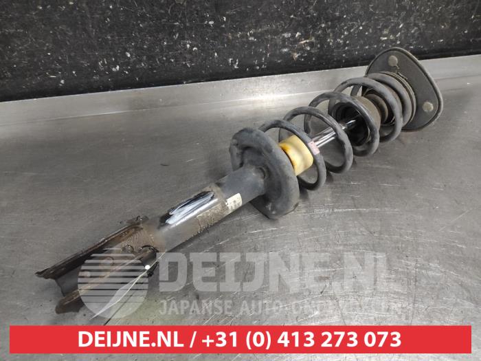 Mitsubishi Colt Stoßdämpferstrebe links vorne O711211