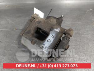 Toyota IQ Bremszange links vorne O711423 foto 2