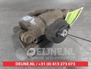 Toyota IQ Bremszange links vorne O711423 foto 3