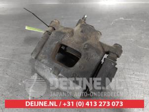 Toyota IQ Front brake calliper, right O711424 photo 2