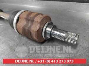 Nissan Juke Aandrijfas links-voor O711580 foto 2