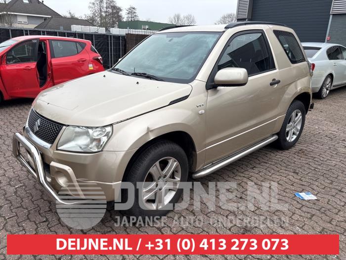 Suzuki Grand Vitara Scheinwerfer links O712002