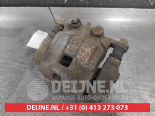 Suzuki Swift Front brake calliper, left O712175 photo 2