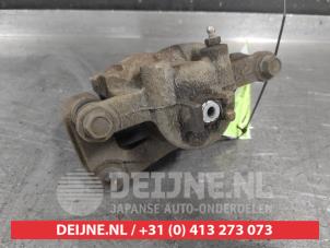 Suzuki Swift Front brake calliper, left O712175 photo 3