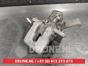 Suzuki Swift Bremszange links hinten O712177 foto 2