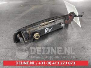 Toyota Starlet Portiergreep 2Deurs rechts O713542 foto 2