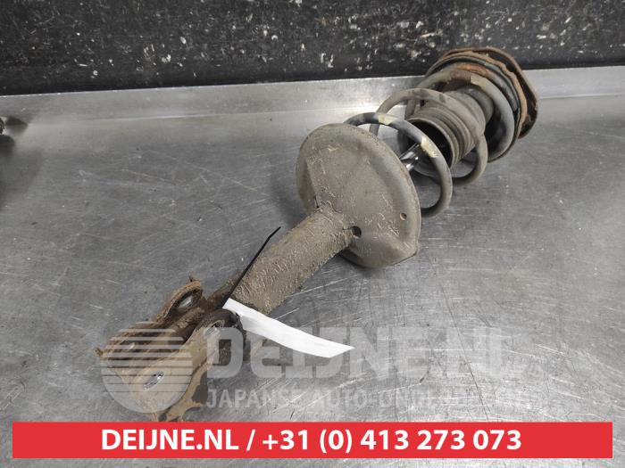 Toyota Starlet Front shock absorber rod, right O713560