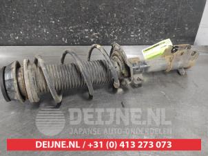 Suzuki Swift Front shock absorber rod, right O714870 photo 2