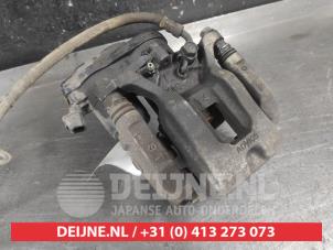 Toyota Rav-4 Bremszange links hinten O715397 foto 2