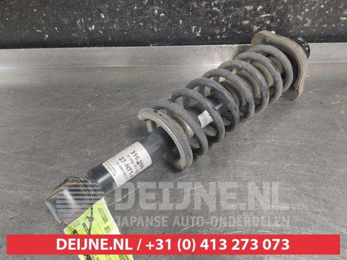 Mitsubishi Outlander Stoßdämpferstrebe links hinten O716174