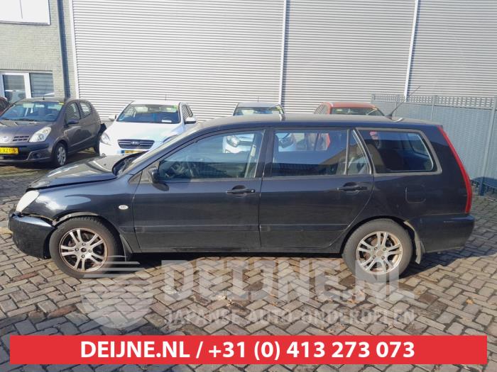 Mitsubishi Lancer Driehoeks Ruit links-achter O716261