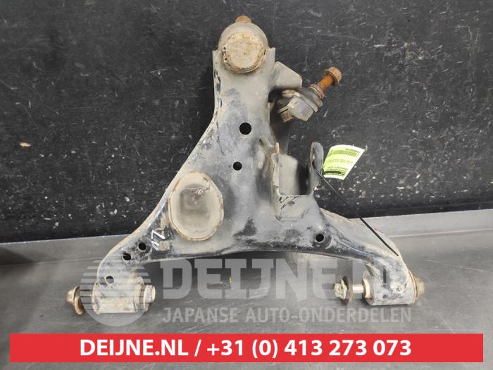 Nissan Navara Draagarm onder links-voor O716299