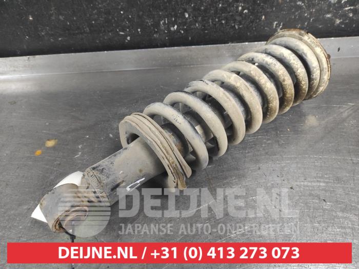 Nissan Navara Front shock absorber rod, left O716303