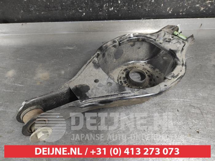 Nissan Qashqai Draagarm links-achter O716565