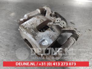 Nissan Qashqai Rear brake calliper, left O716580 photo 2