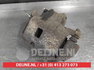 Mitsubishi Lancer Remklauw (Tang) rechts-voor O716824 foto 2