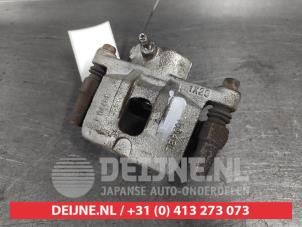 Mitsubishi Lancer Remklauw (Tang) links-achter O716832 foto 2