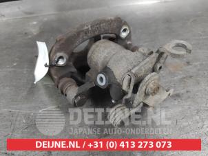 Mitsubishi Colt Rear brake calliper, left O719053 photo 2