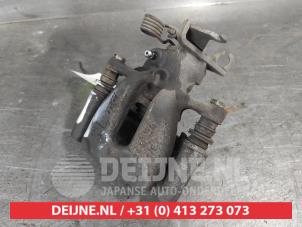 Mitsubishi Colt Rear brake calliper, left O719053 photo 3
