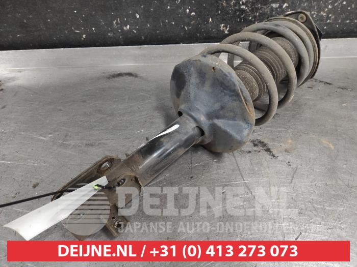 Suzuki Swift Schokdemperpoot links-voor O719422