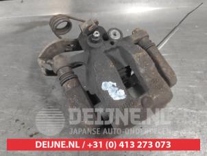 Kia Rio Bremszange links hinten O719824 foto 2