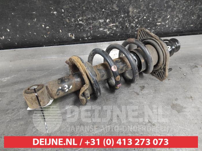 Honda CR-V Schokdemperpoot links-achter O721862