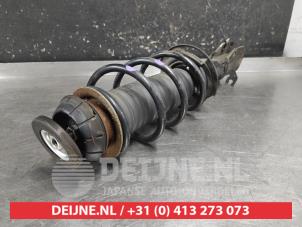 Suzuki Swift Front shock absorber rod, right O722257 photo 2