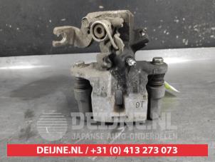 Suzuki Swift Rear brake calliper, left O722262 photo 3