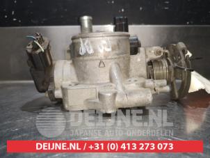 Mazda 323F Gasklephuis O356086 foto 2