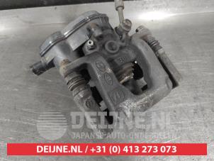Kia Sportage Rear brake calliper, left O723033 photo 2