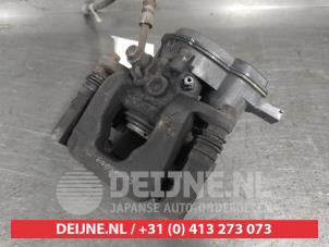 Kia Sportage Bremszange rechts hinten O723034 foto 2