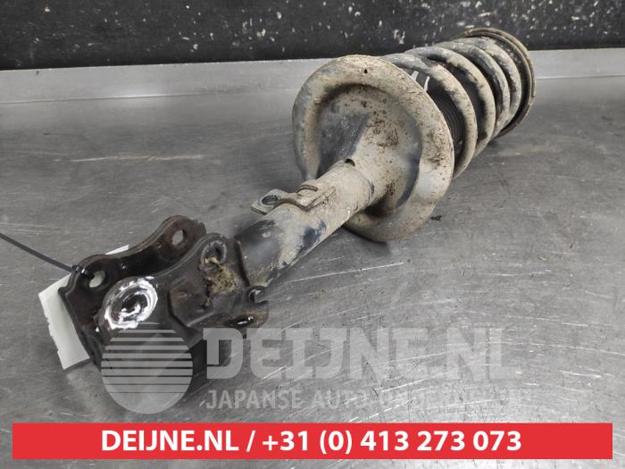 Suzuki Swift Schokdemperpoot links-voor O723325