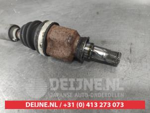 Mitsubishi Colt Aandrijfas links-voor O723506 foto 2