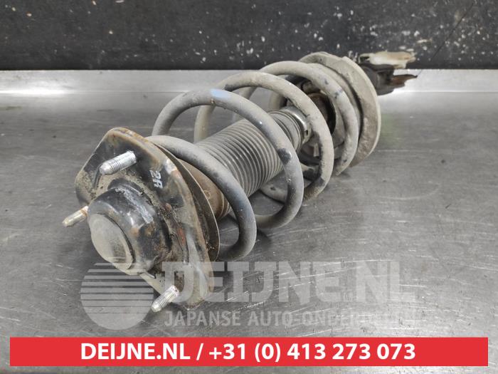 Ssang Yong Korando Schokdemperpoot rechts-voor O723559