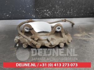 Mitsubishi Pajero Bremszange links vorne O724702 foto 2