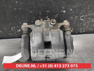 Suzuki Swift Front brake calliper, left O724795 photo 3