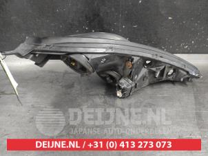 Toyota Celica Headlight, left O725045 photo 2