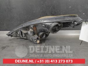 Toyota Celica Koplamp rechts O725046 foto 2