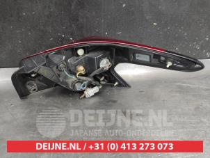 Nissan Micra Rücklicht links O725215 foto 2