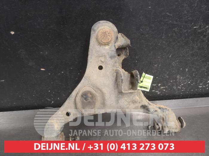 Nissan Navara Front lower wishbone, left O725399