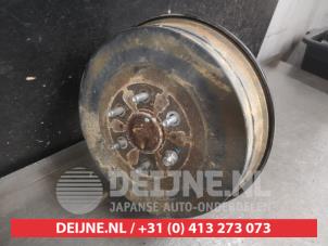 Nissan Navara Aandrijfas links-achter O725407 foto 2