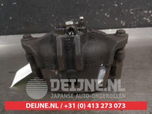 Toyota Yaris Front brake calliper, left O725493 photo 3