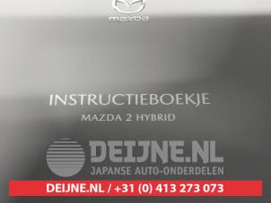 Mazda 2 Hybrid Instruction Booklet O725536 photo 2