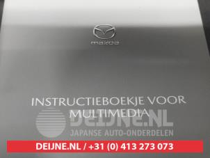 Mazda 2 Hybrid Instruction Booklet O725536 photo 3