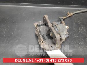 Toyota Yaris Bremszange links vorne O725721 foto 2